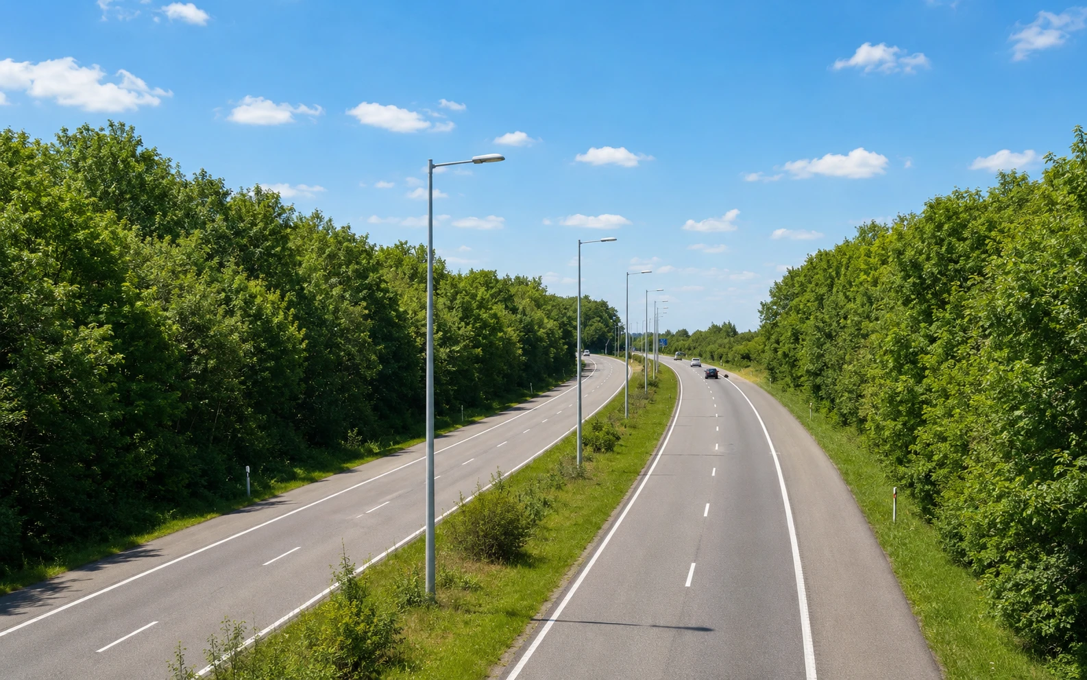 Road with two lanes in each direction and a physical median